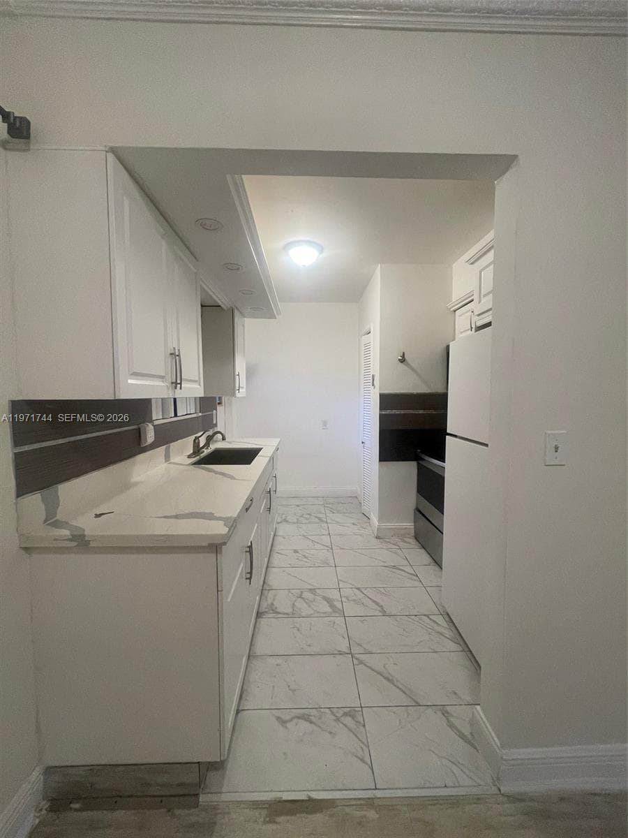 121 NE 169th Ter, North Miami Beach FL 33162 — 1