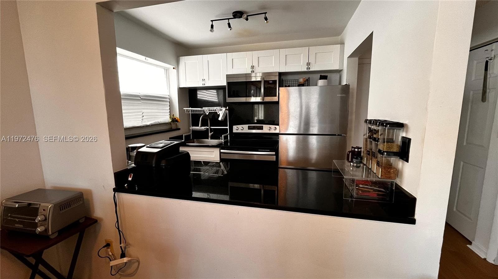 1990 Marseille Dr # 407, Miami Beach FL 33141 — 1