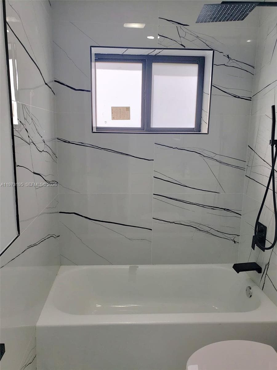 150 NE 169th Ter, North Miami Beach FL 33162 — 23