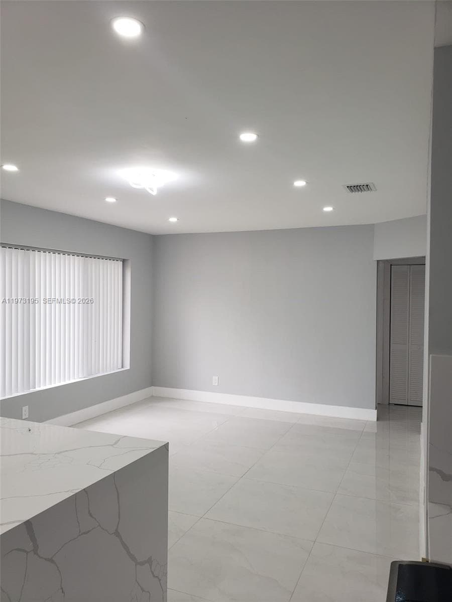 150 NE 169th Ter, North Miami Beach FL 33162 — 17