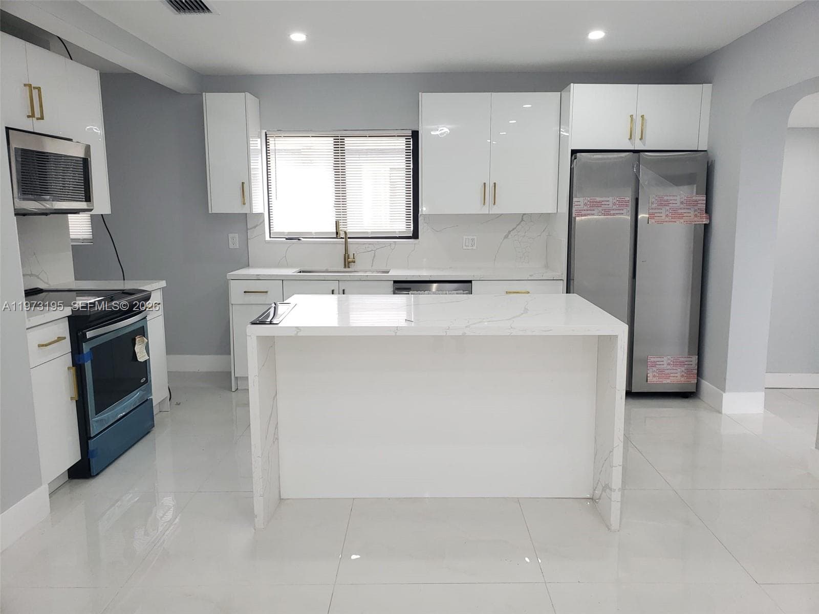 150 NE 169th Ter, North Miami Beach FL 33162 — 12