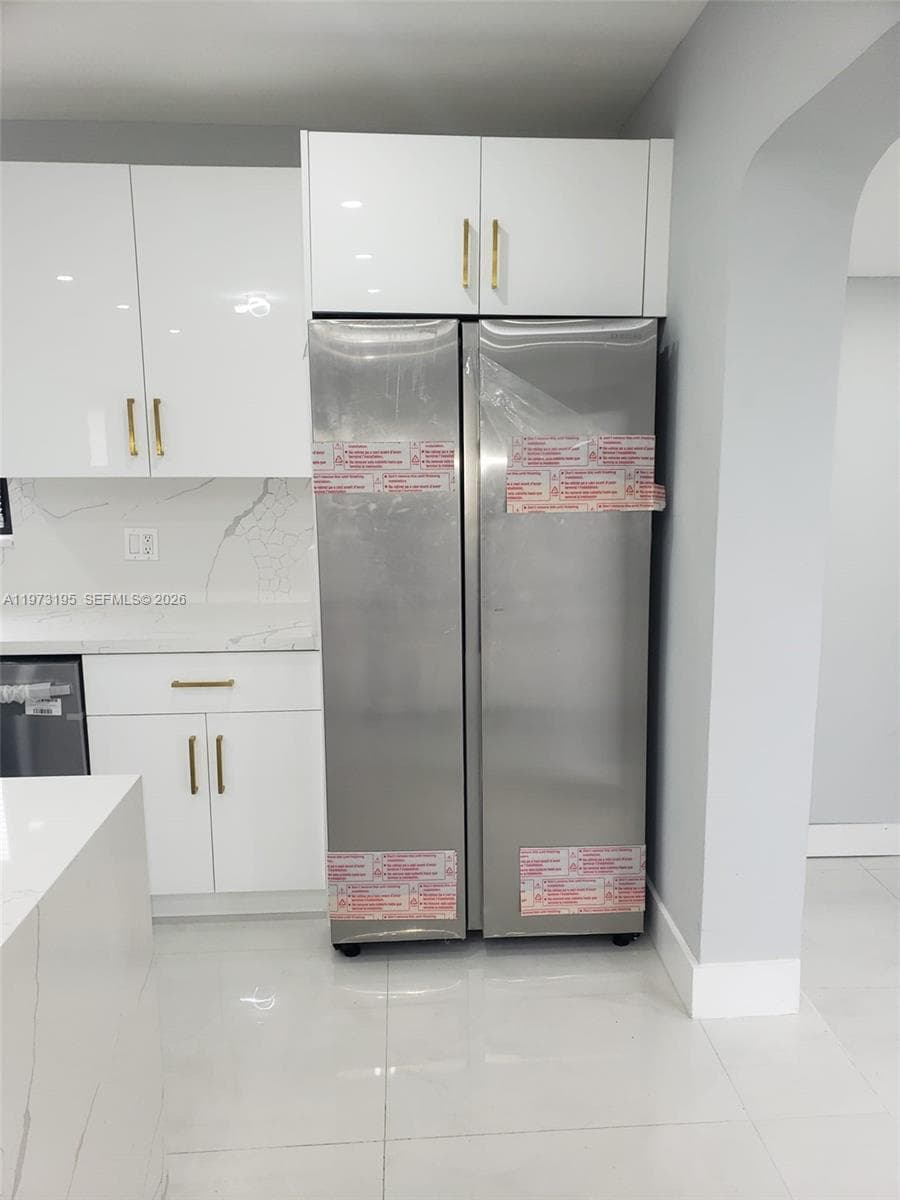 150 NE 169th Ter, North Miami Beach FL 33162 — 11