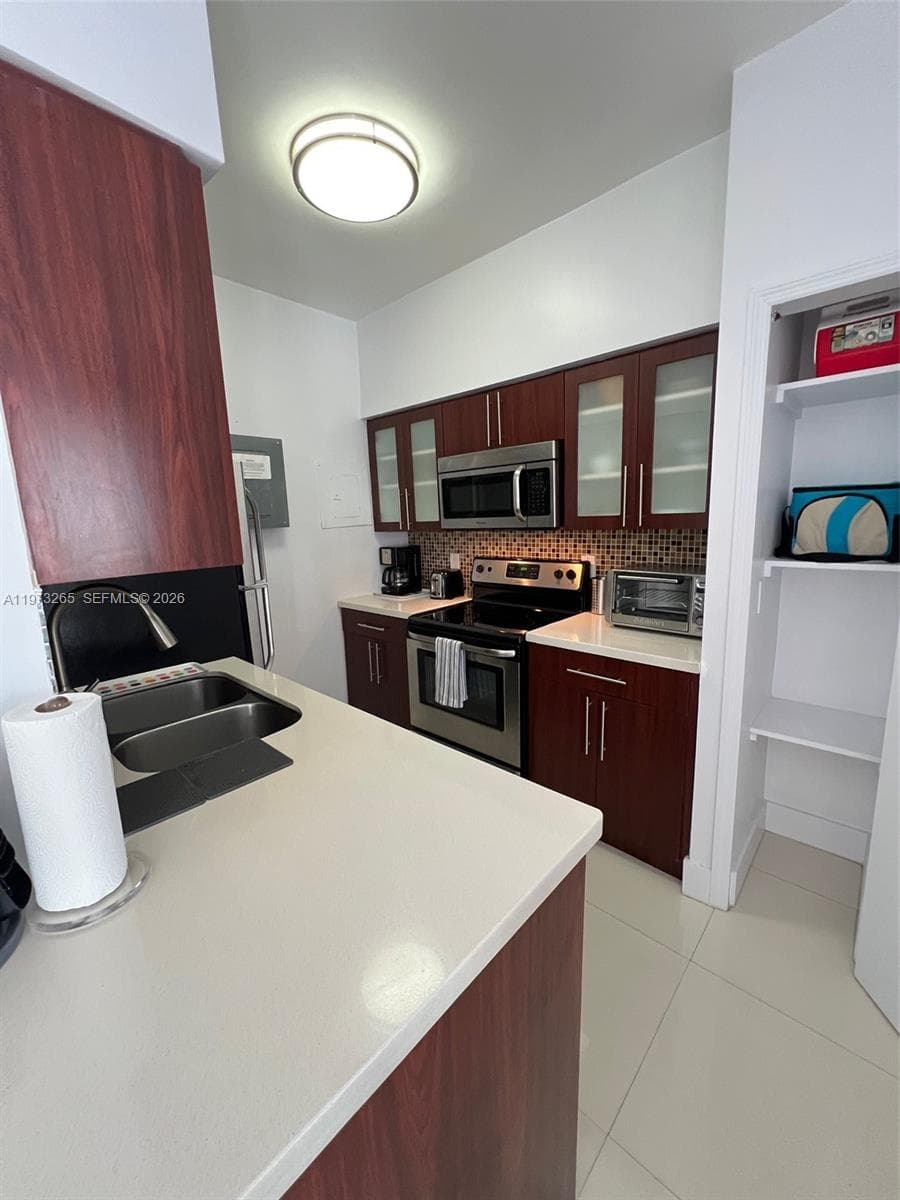 1100 Collins Ave # 303, Miami Beach FL 33139 — 2