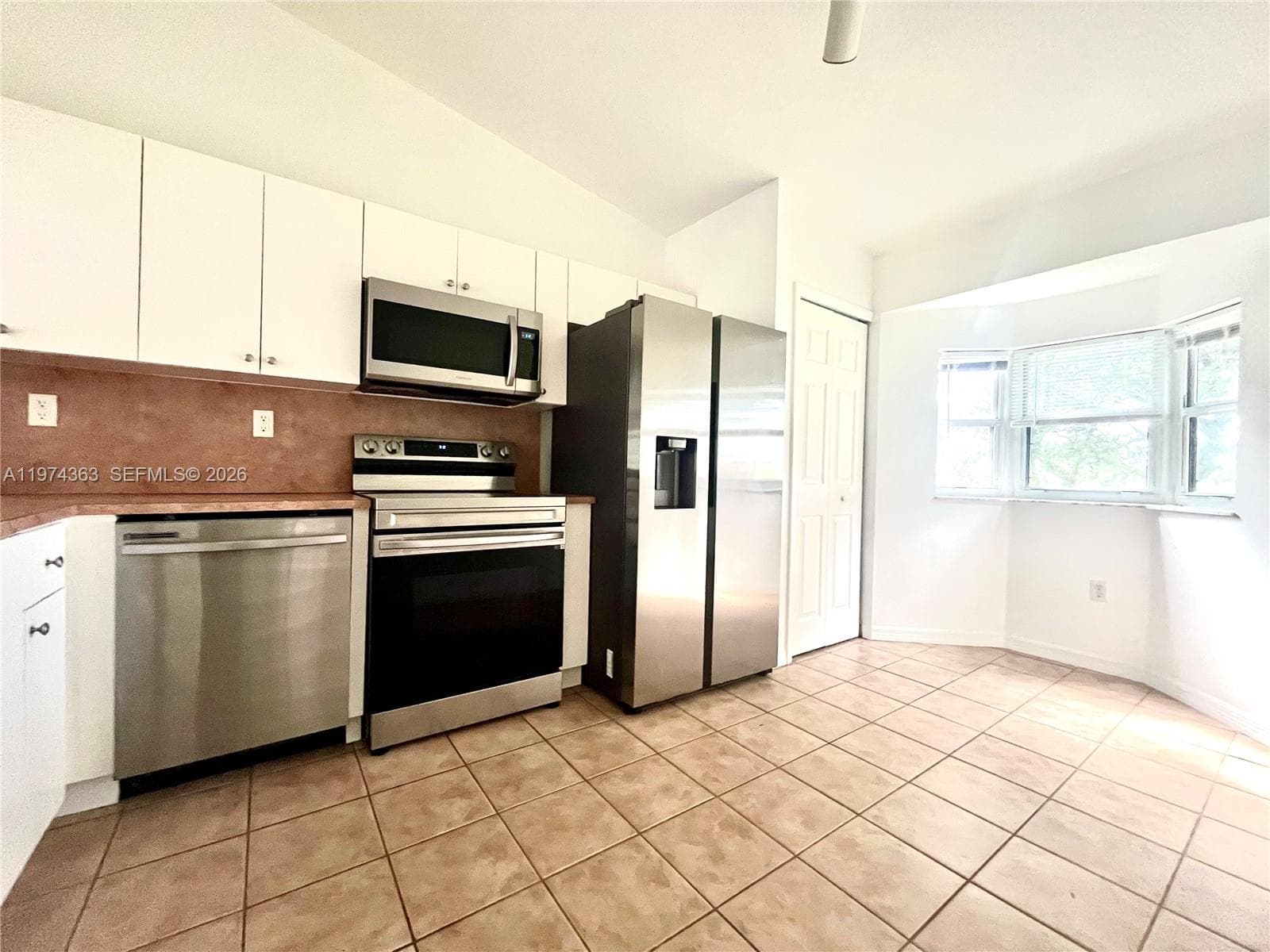 930 NE 33rd Terr # 203, Homestead FL 33033 — 5