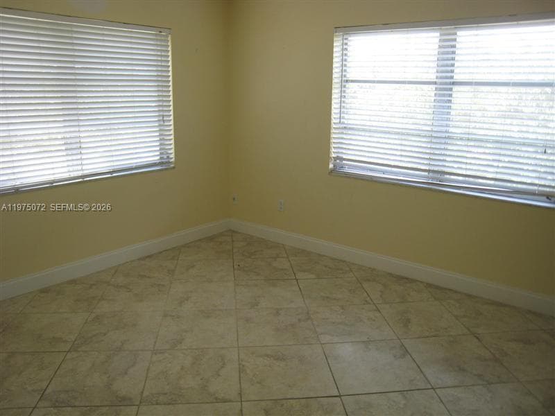 7722 Camino Real # E301, Miami FL 33143 — 5