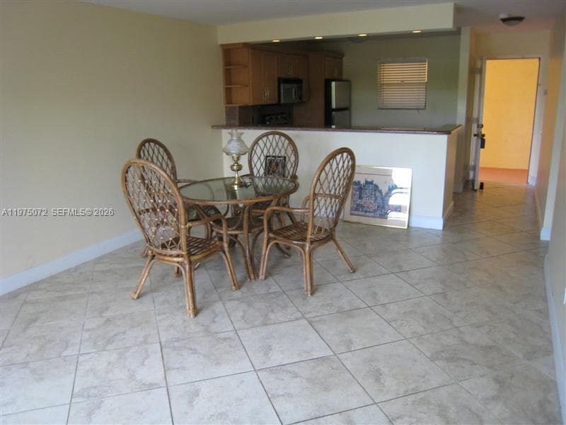 7722 Camino Real # E301, Miami FL 33143 — 4