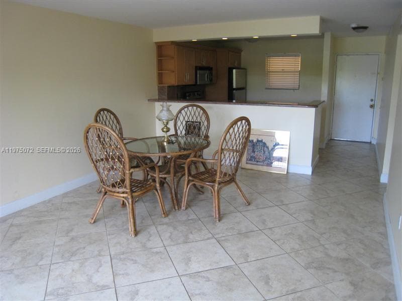 7722 Camino Real # E301, Miami FL 33143 — 8