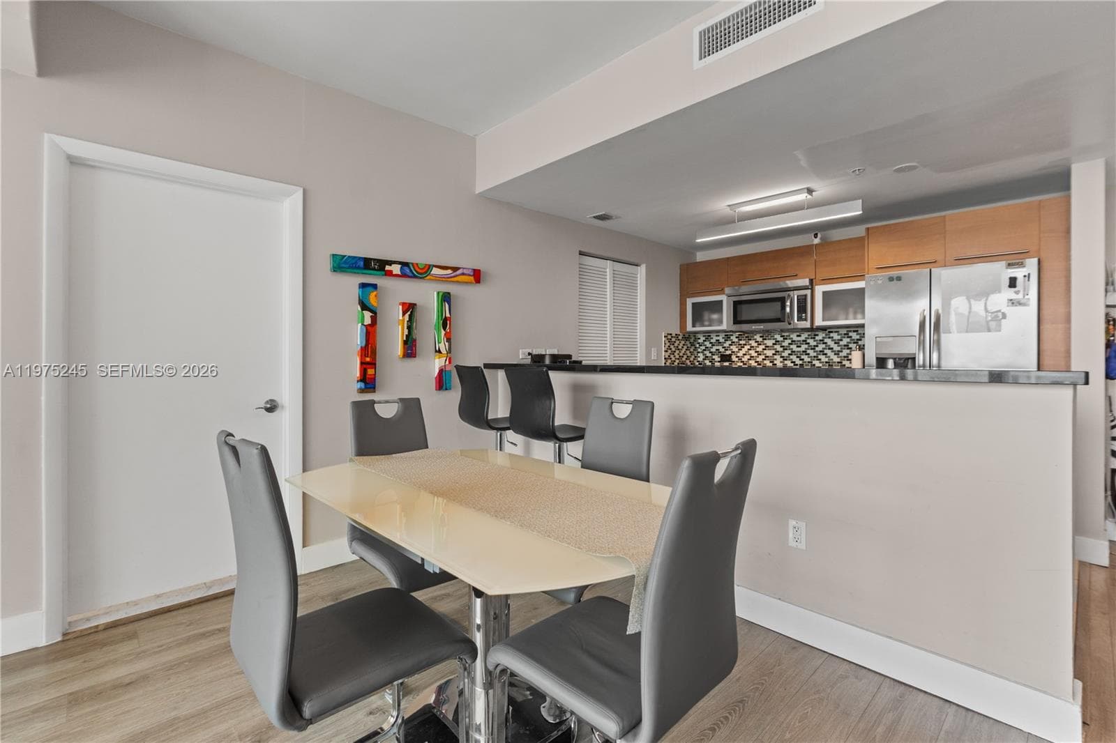 244 Biscayne Blvd # 2410, Miami FL 33132 — 7
