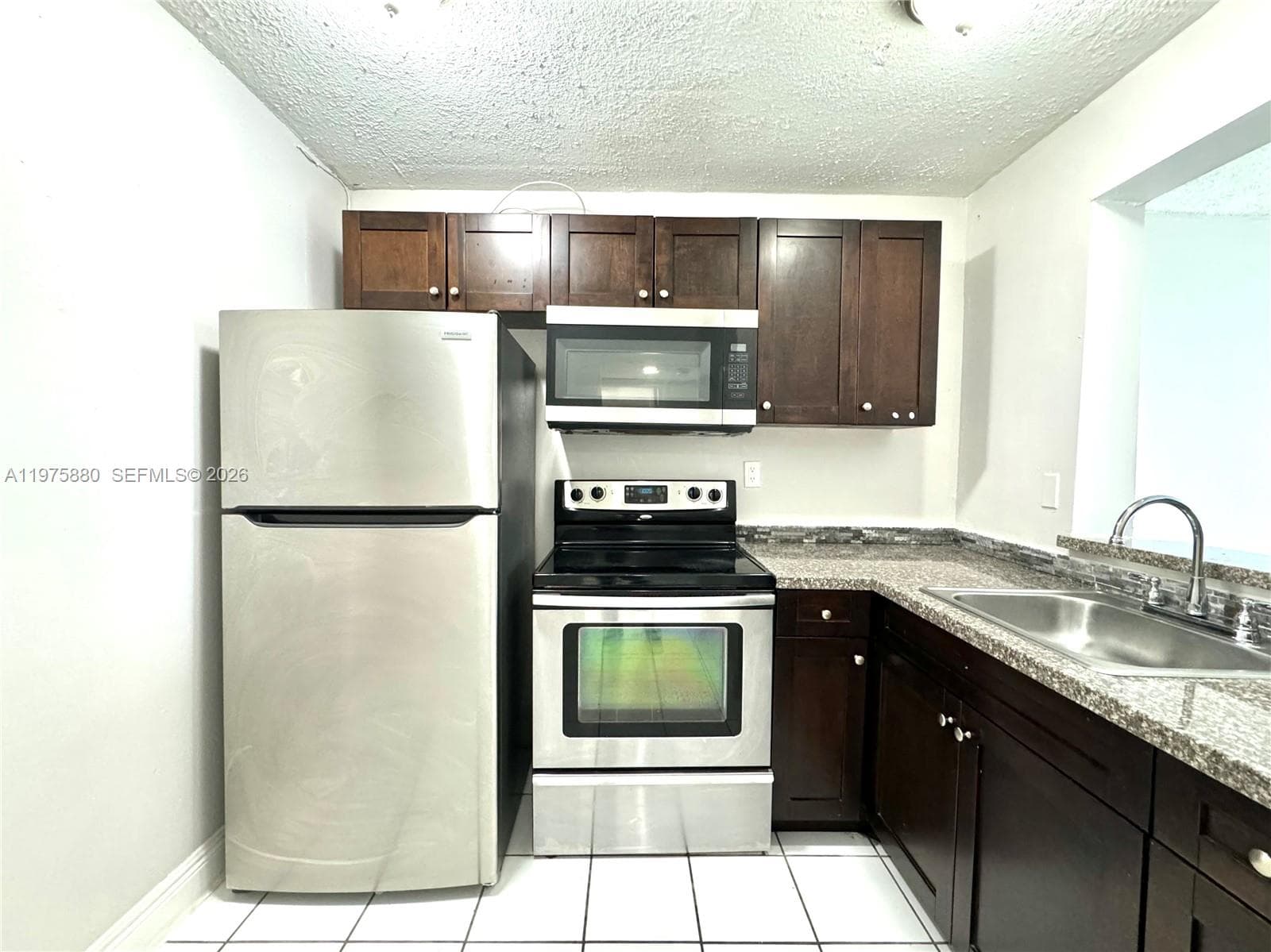 484 NW 165th St Rd # 411, Miami FL 33169 — 2