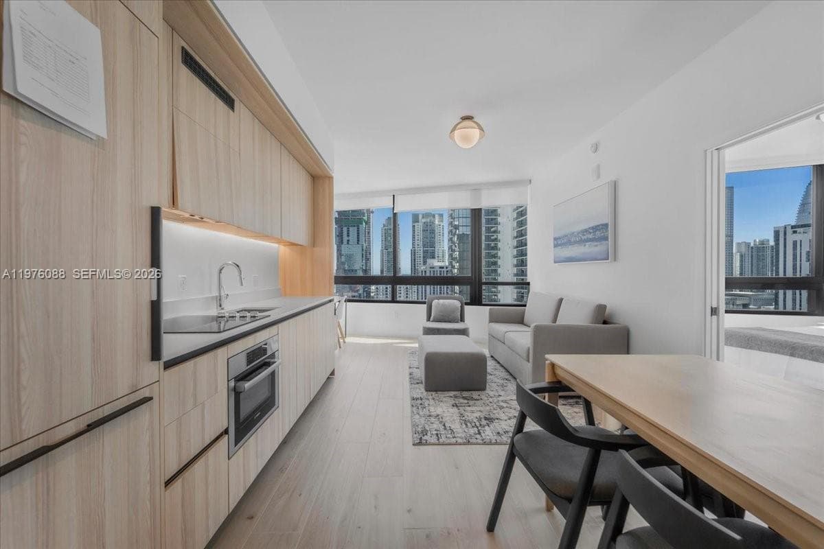225 N Miami # 3009, Miami FL 33128 — 6