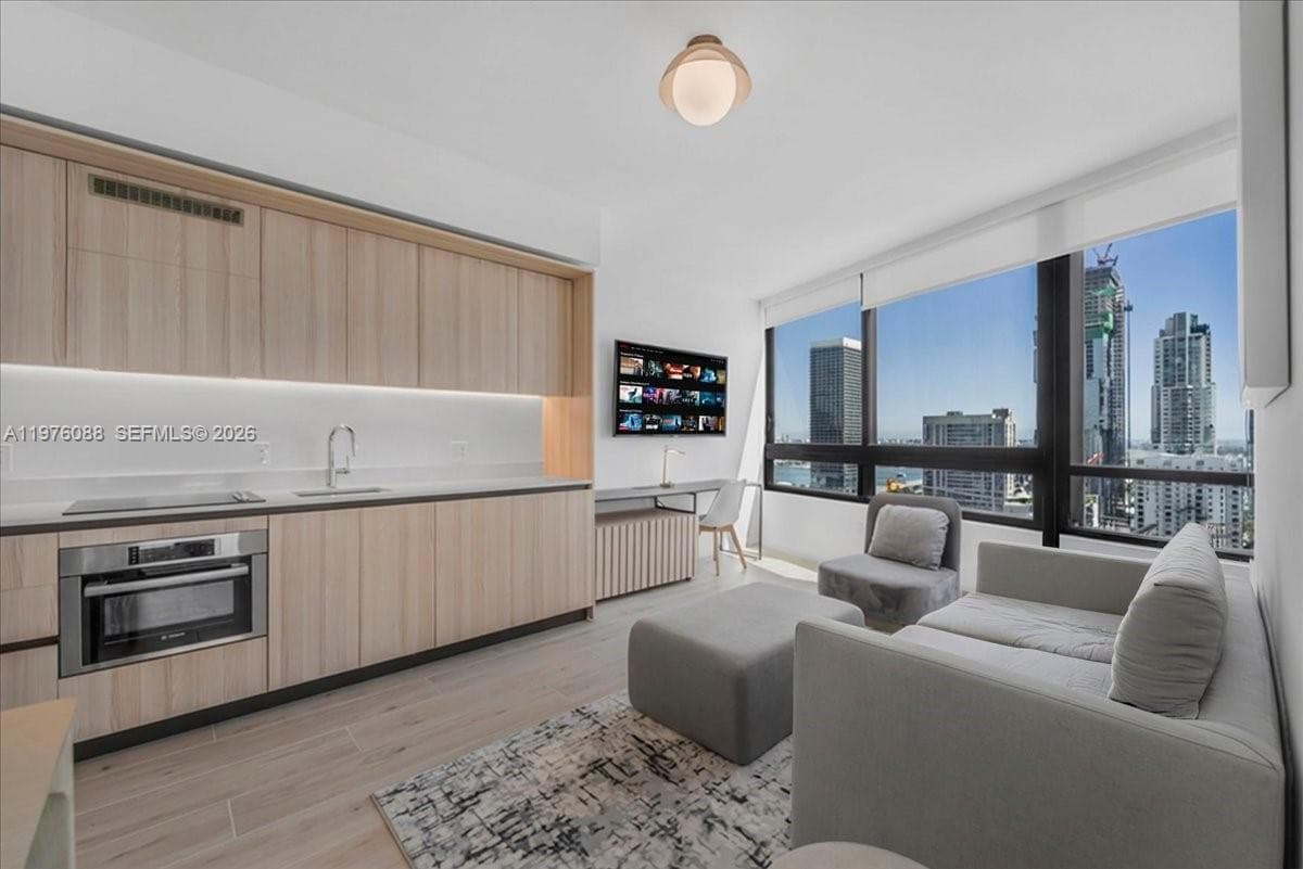 225 N Miami # 3009, Miami FL 33128 — 1