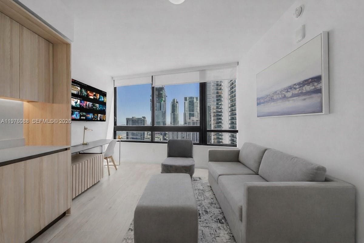 225 N Miami # 3009, Miami FL 33128 — 4
