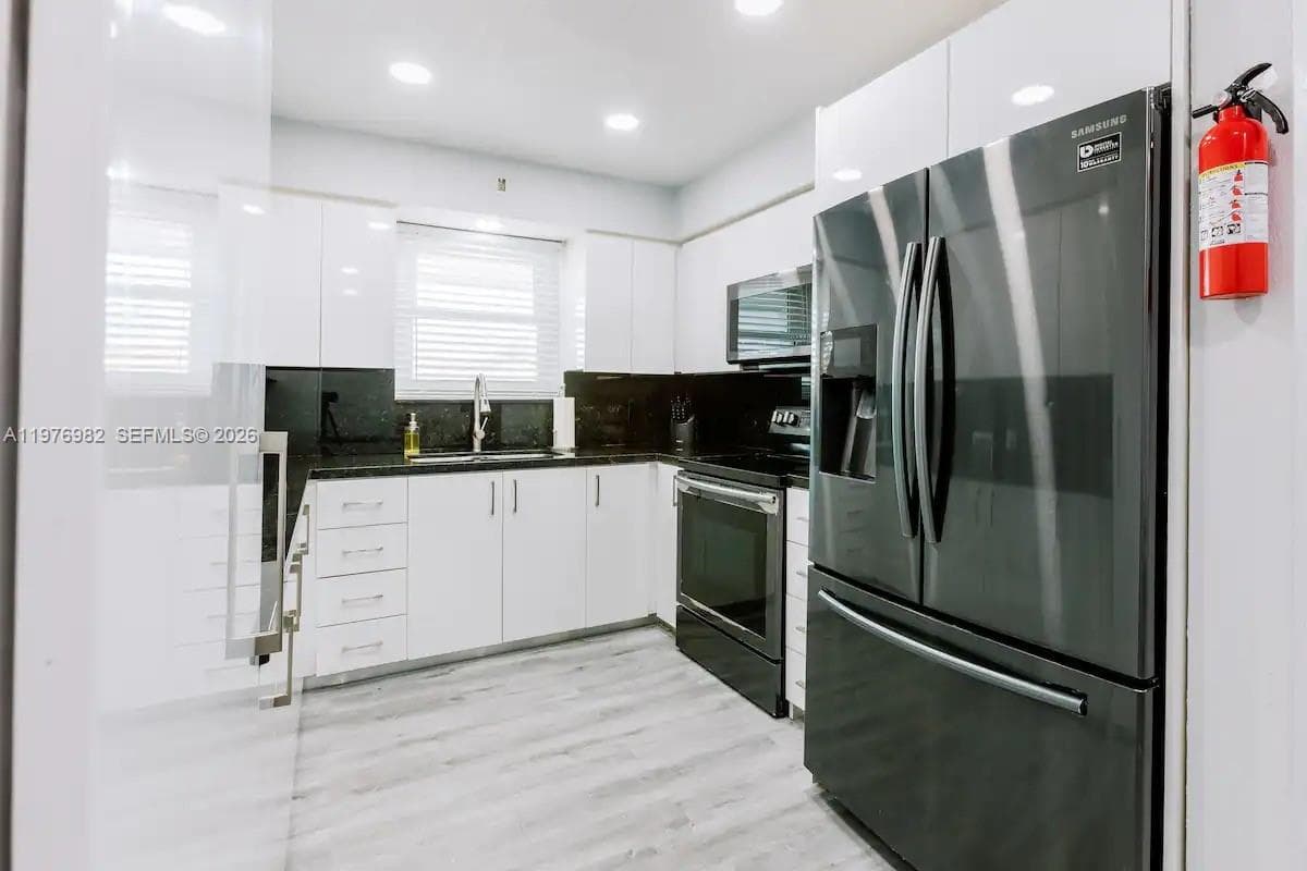 1647 NW 29th Ave, Miami FL 33125 — 4