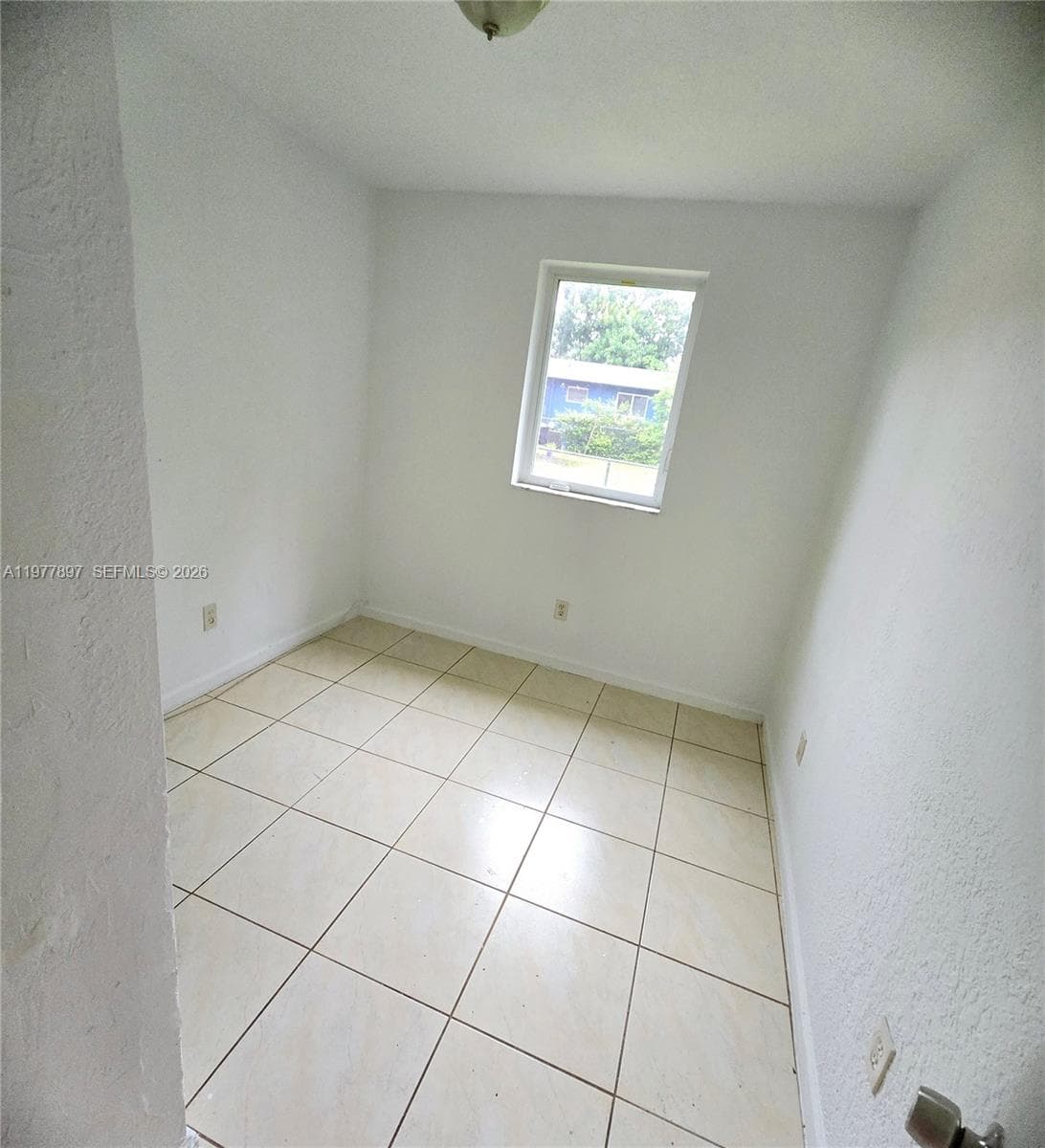 1436 NW 51st Ter, Miami FL 33142 — 5