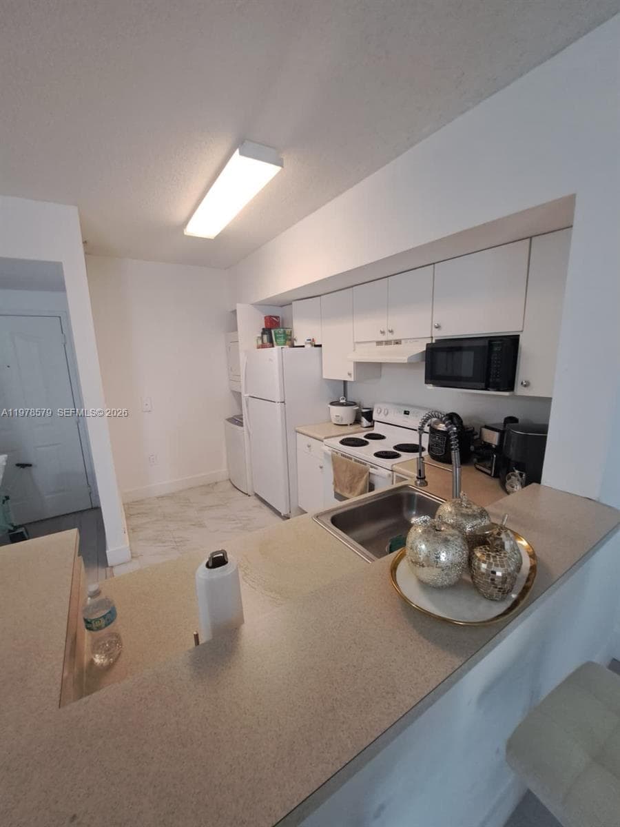 5077 NW 7th St # 912, Miami FL 33126 — 3