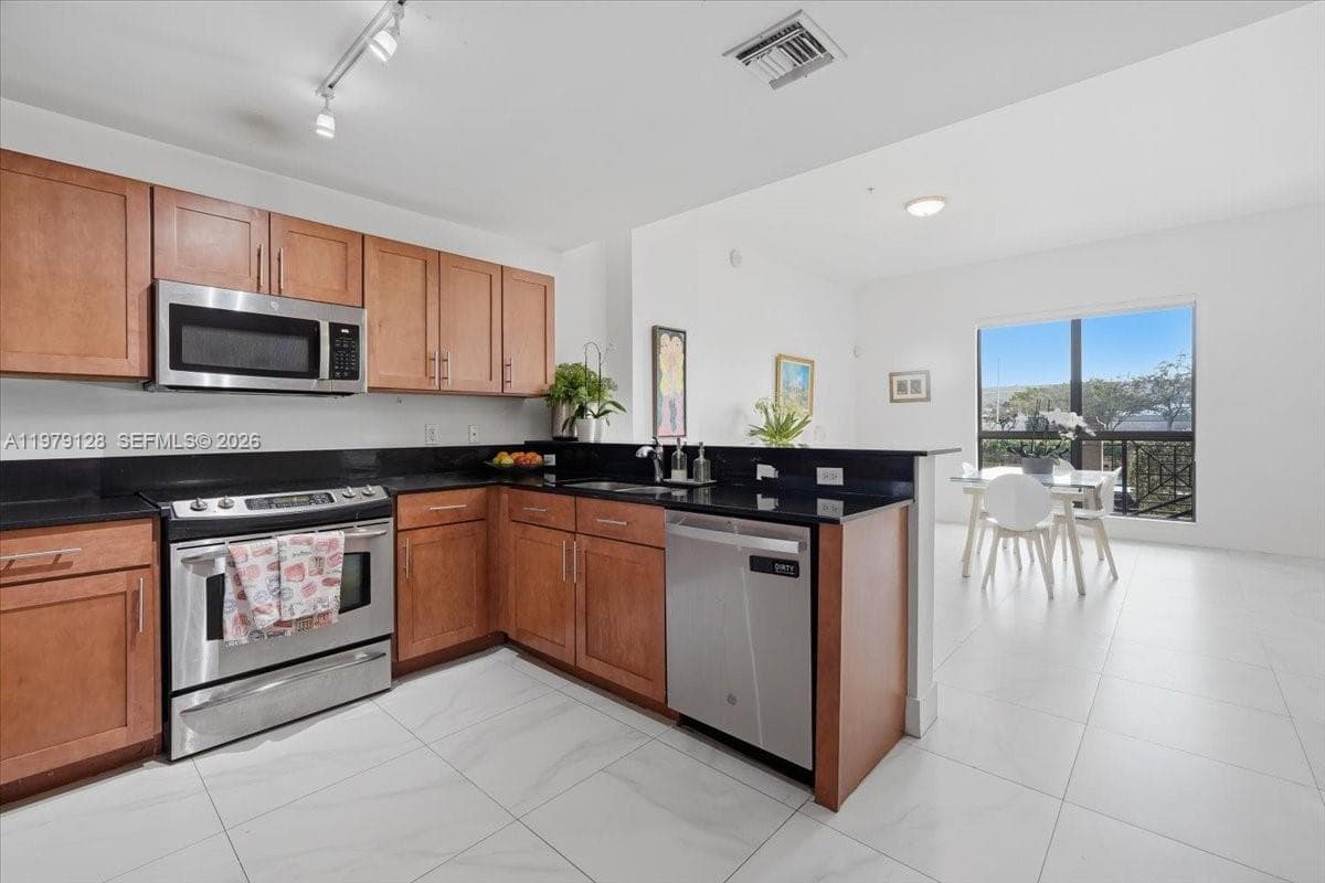 8390 SW 72nd Ave # 106, Miami FL 33143 — 5