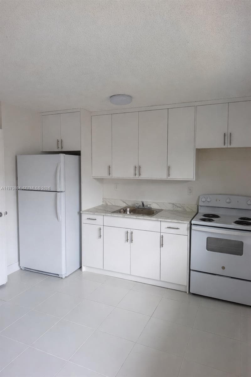 1077 NW 45th Ave # 0, Miami FL 33126 — 2