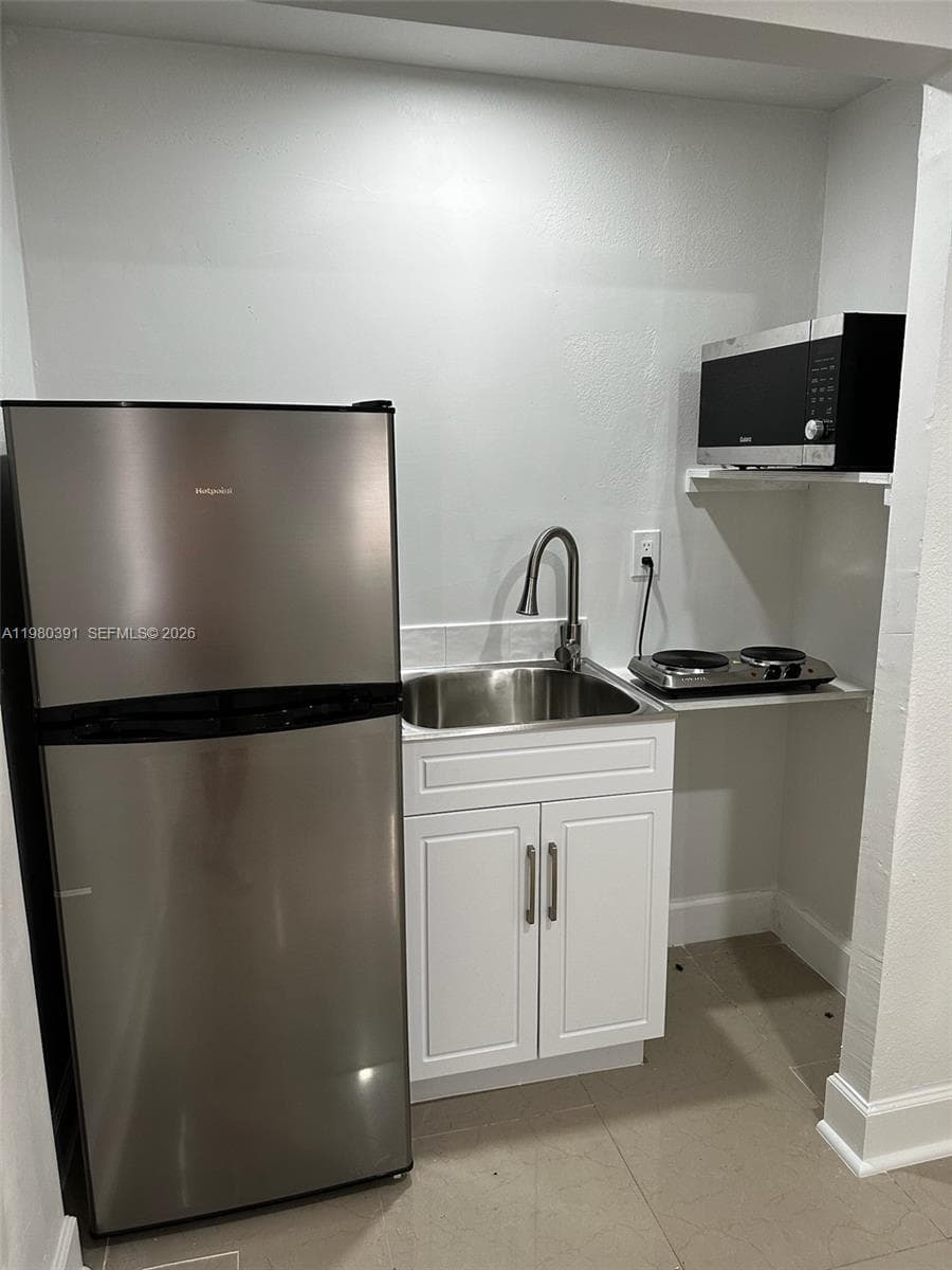 2223 NW 32nd St, Miami FL 33142 — 51