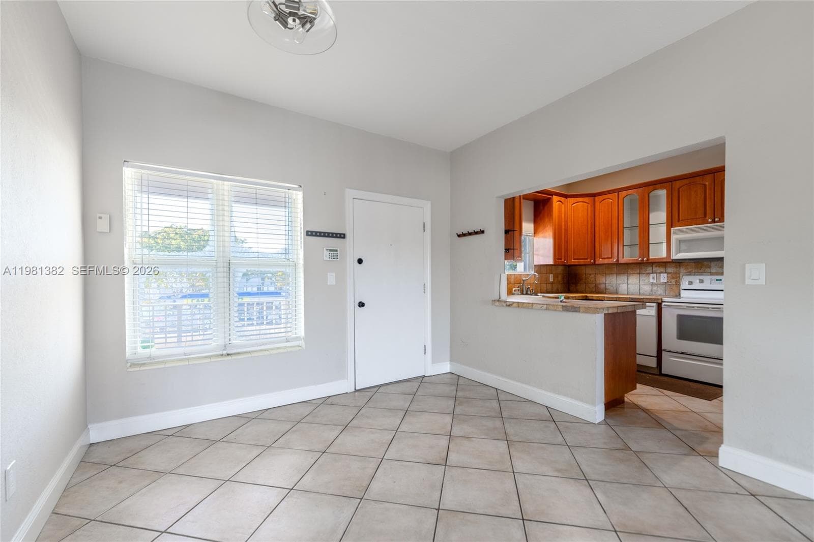 2225 NE 123rd St # 215, North Miami FL 33181 — 9
