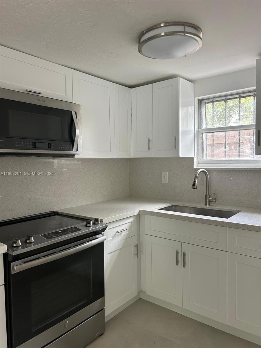 2908 NW 14 ct # 1, Miami FL 33142 — 6