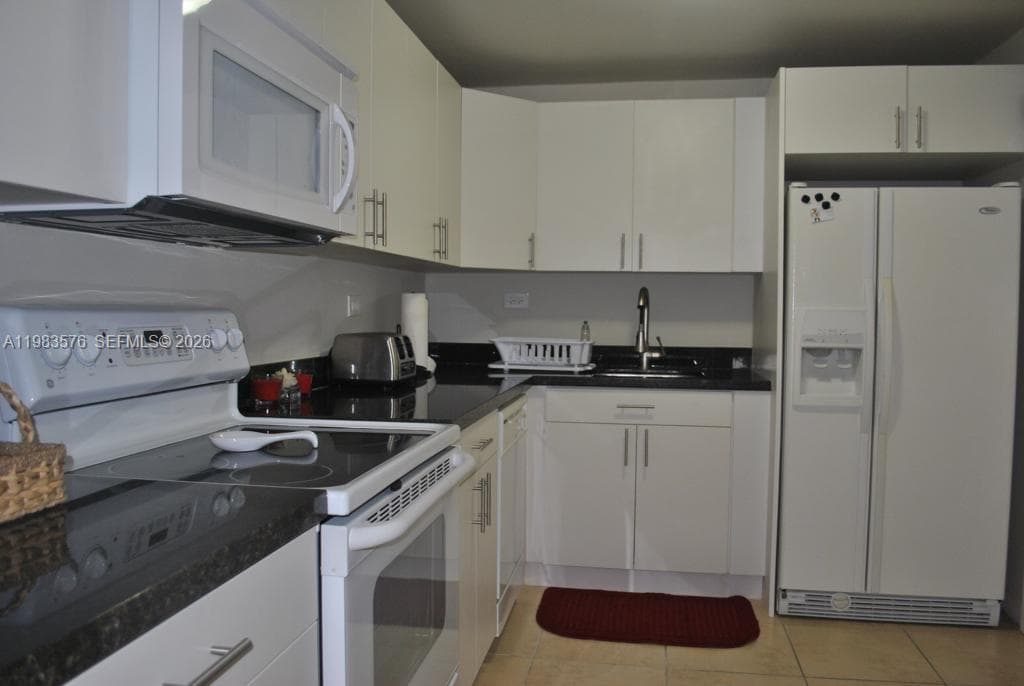 6039 Collins Ave # 1006, Miami Beach FL 33140 — 6