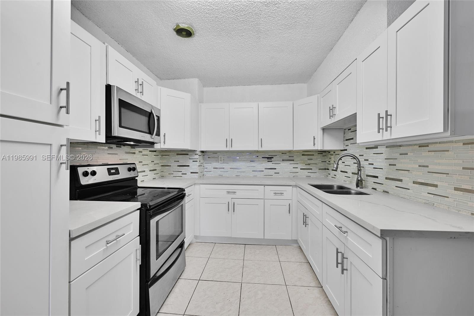 210 E 59th St, Hialeah FL 33013 — 7