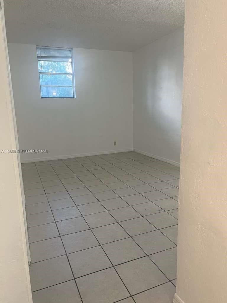 4550 NW 9th St # 114E, Miami FL 33126 — 4