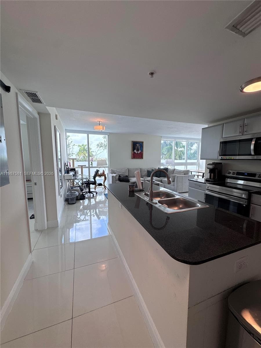 1861 NW S River Dr # 705, Miami FL 33125 — 4