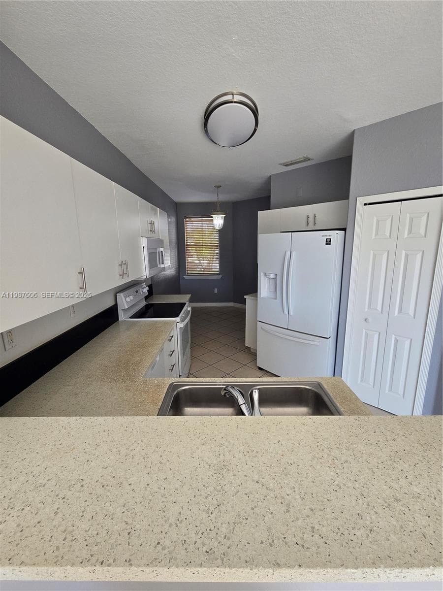 5630 NW 107th Ave # 1605, Doral FL 33178 — 7