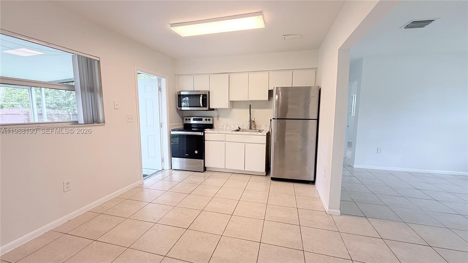 1411 NE 155th Ter, North Miami Beach FL 33162 — 6