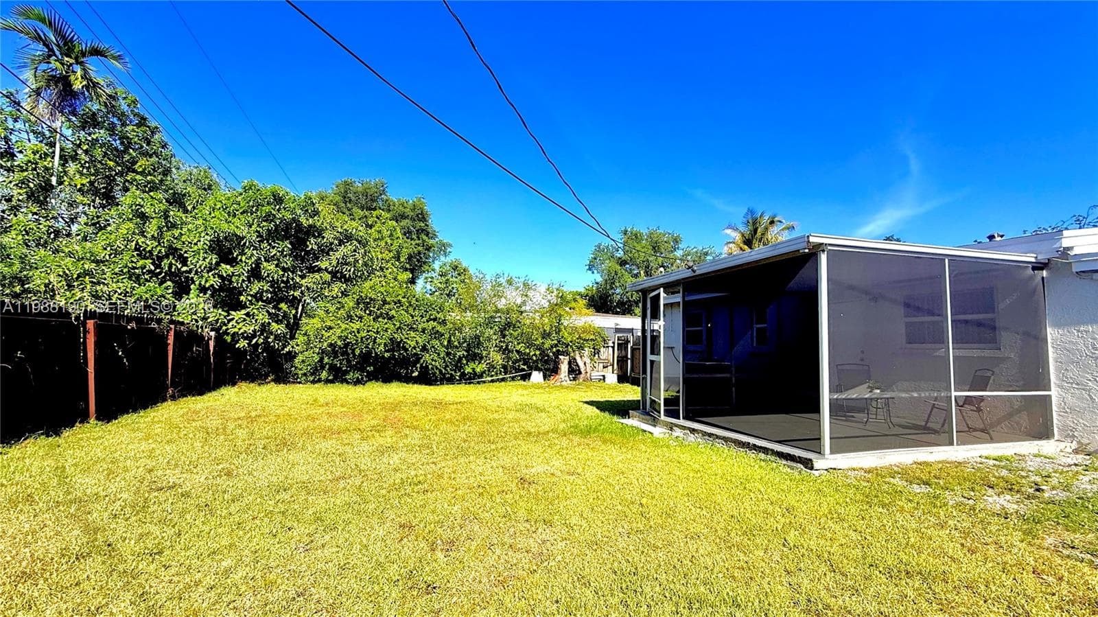 1411 NE 155th Ter, North Miami Beach FL 33162 — 24