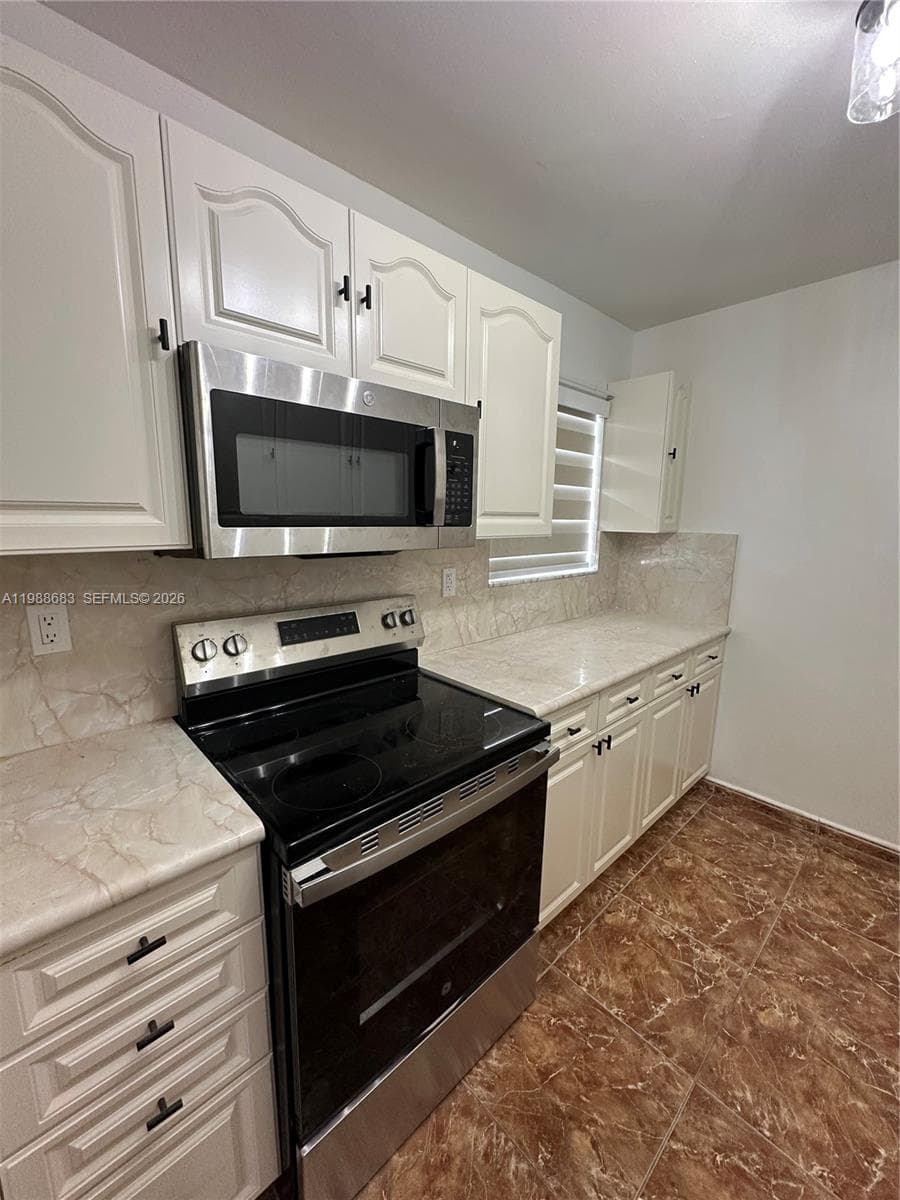 6091 W 22nd Ct # 408, Hialeah FL 33016 — 3