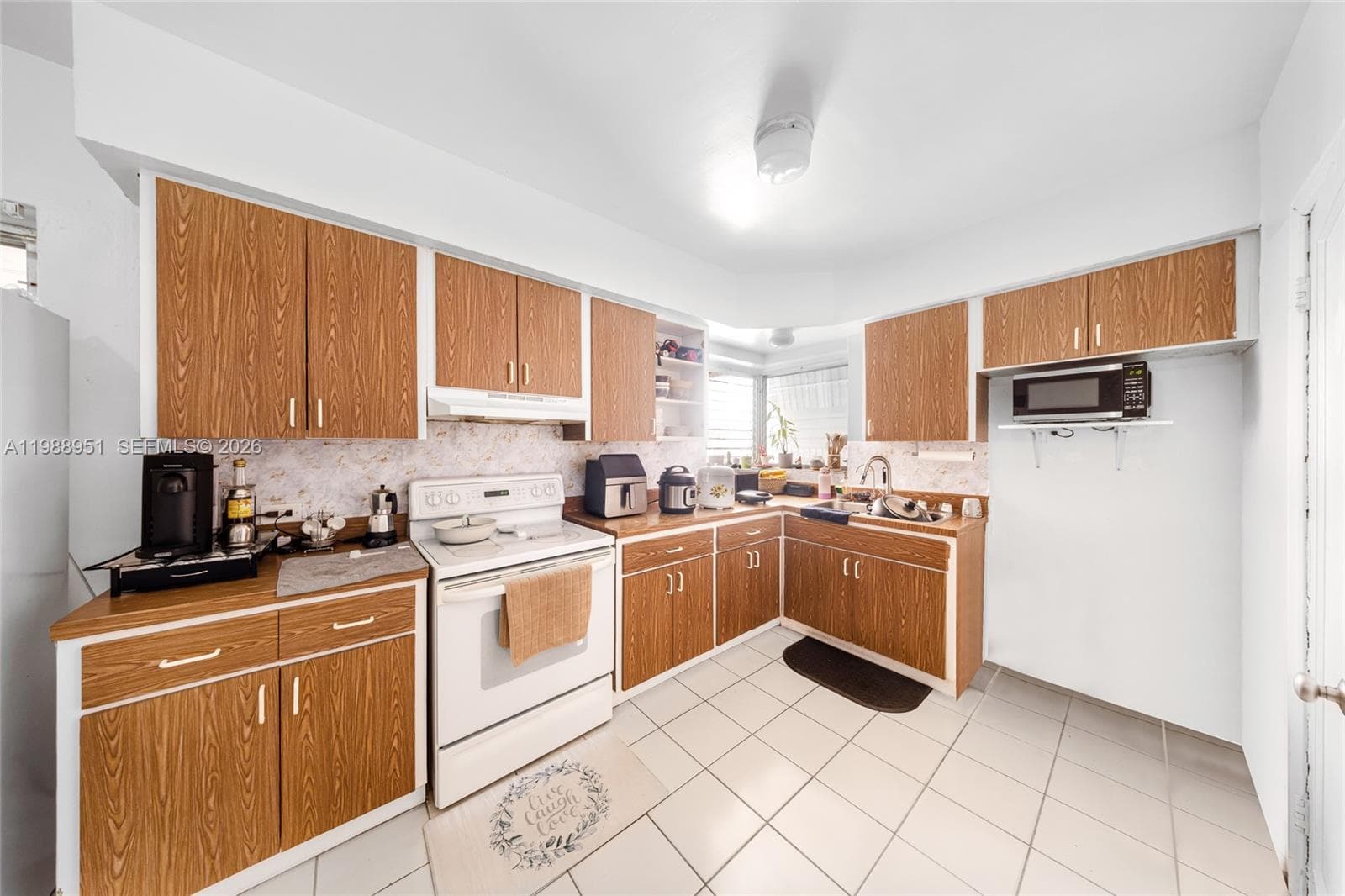 605 NW 34th Ave, Miami FL 33125 — 17