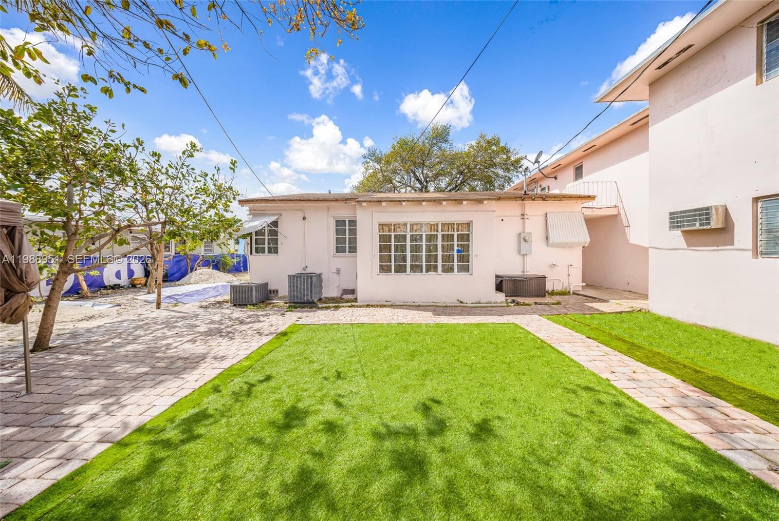 605 NW 34th Ave, Miami FL 33125 — 32