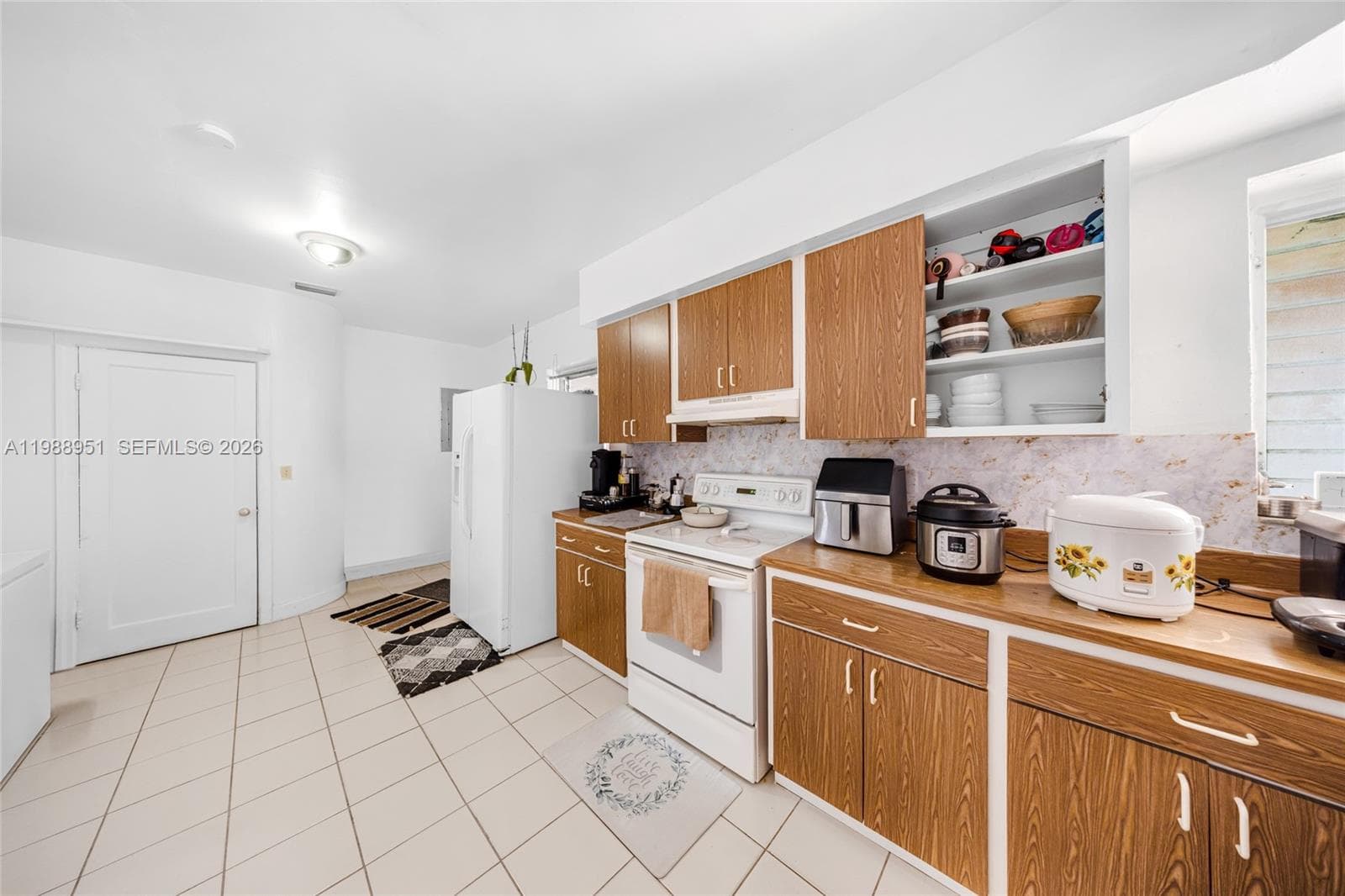 605 NW 34th Ave, Miami FL 33125 — 18