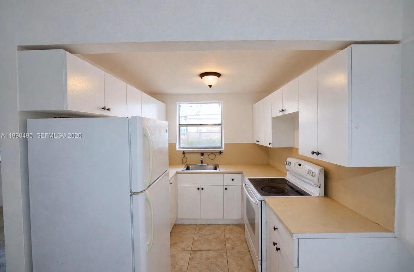 12275 NE 19th Ave # 4, North Miami FL 33181 — 3