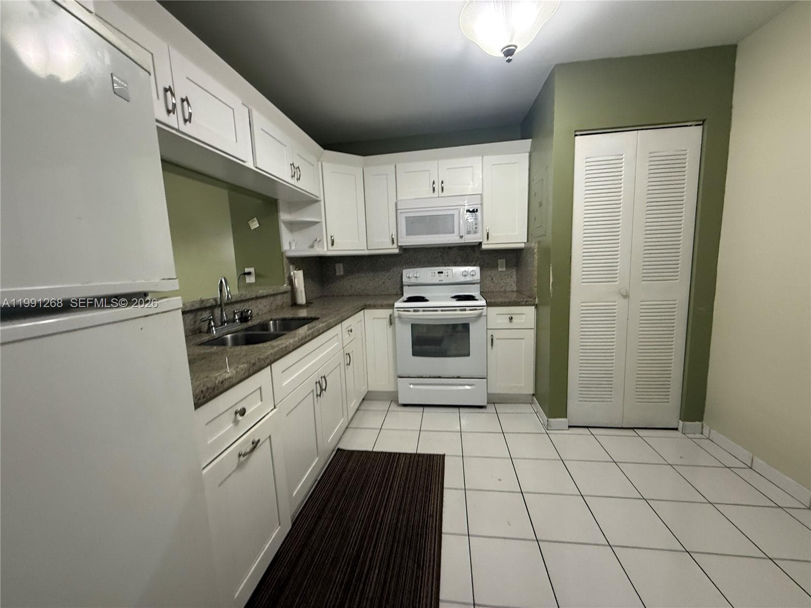 1800 W 54th St # 108, Hialeah FL 33012 — 5
