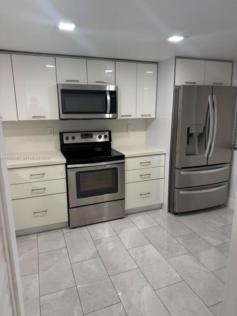 10000 NW 9th St Cir # 11, Miami FL 33172 — 4
