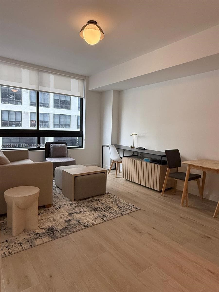 225 N Miami Ave # 910, Miami FL 33128 — 8