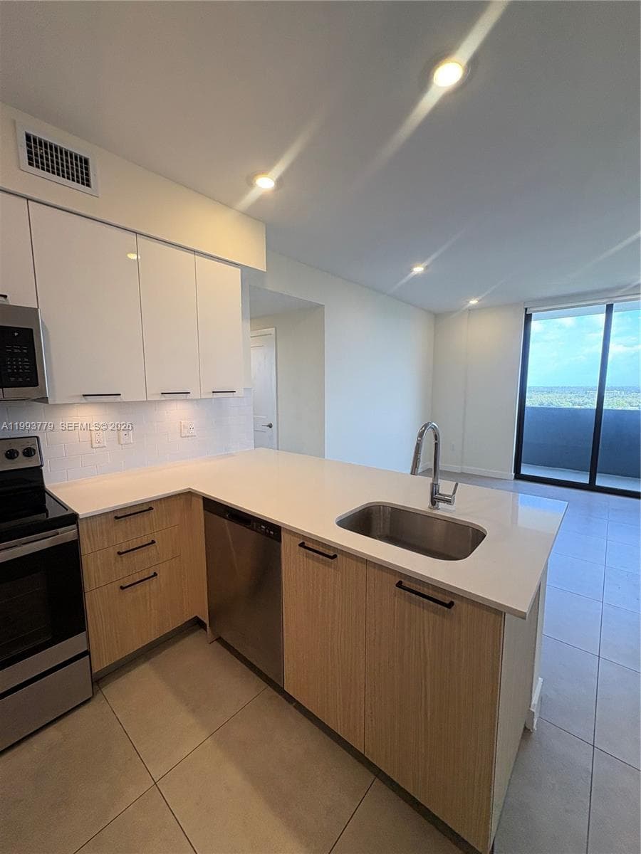 16395 Biscayne Blvd # 2010, North Miami Beach FL 33160 — 4