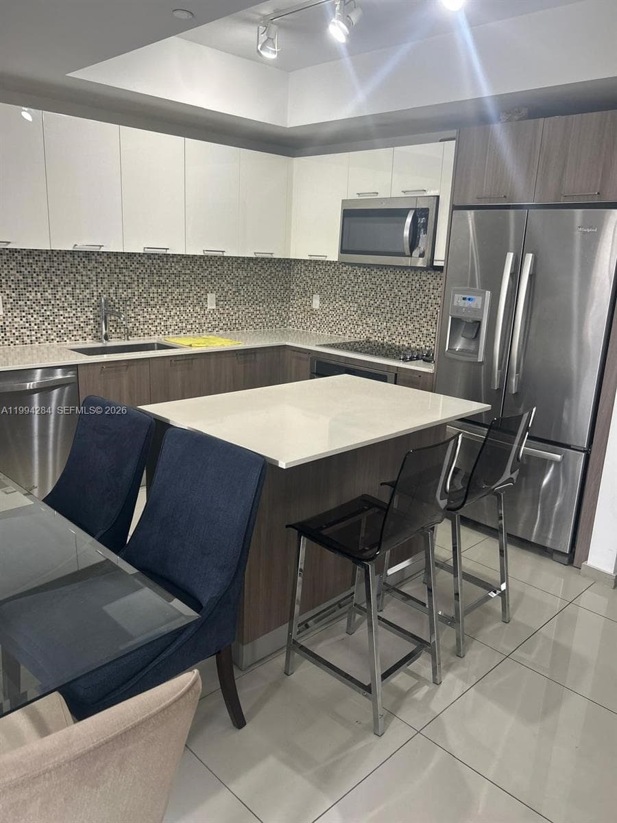 5300 NW 85 # 1106, Doral FL 33166 — 12