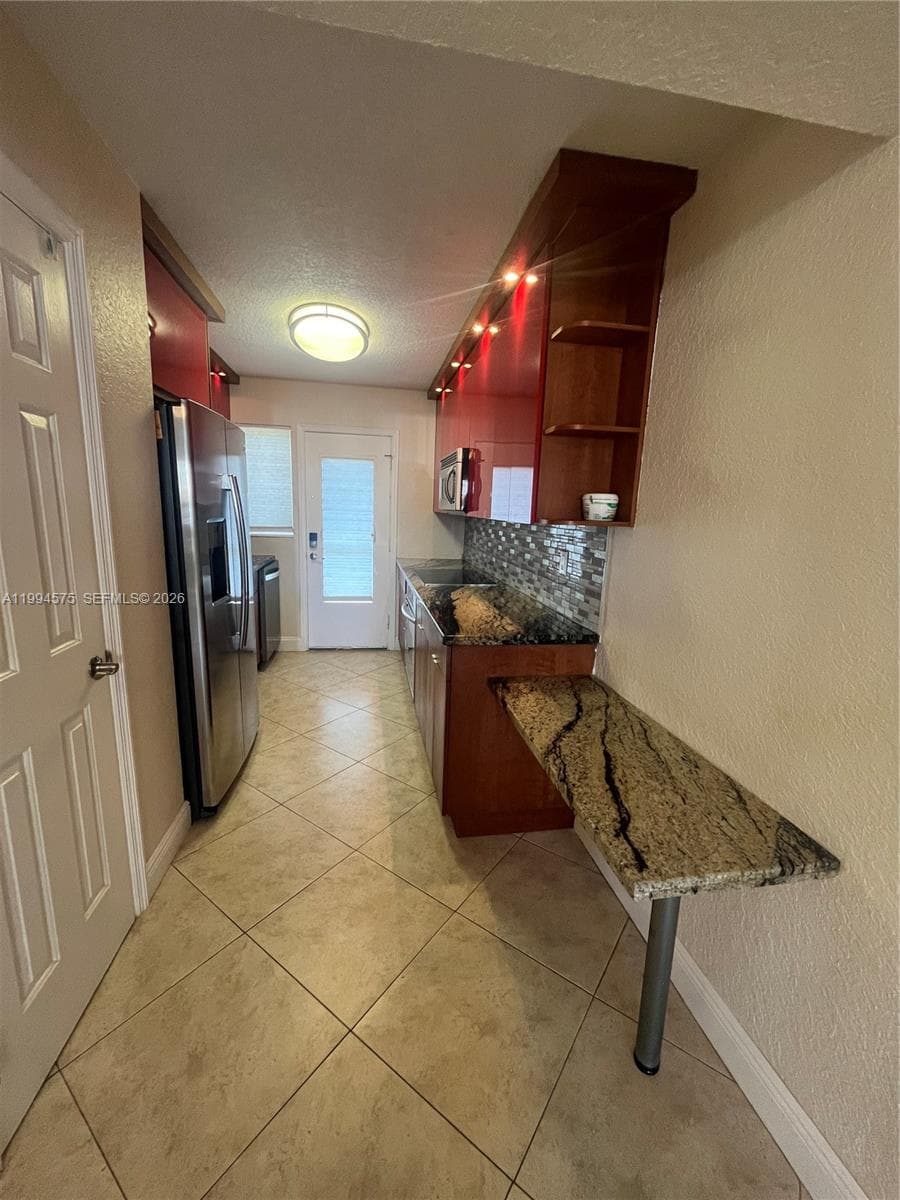 3923 NE 166th St # 106, North Miami Beach FL 33160 — 12