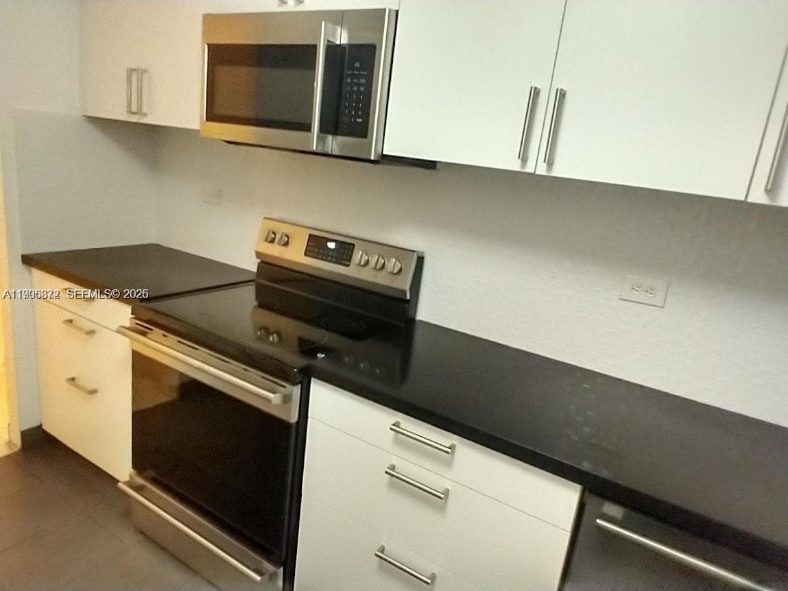 6039 Collins Ave # 407, Miami Beach FL 33140 — 13