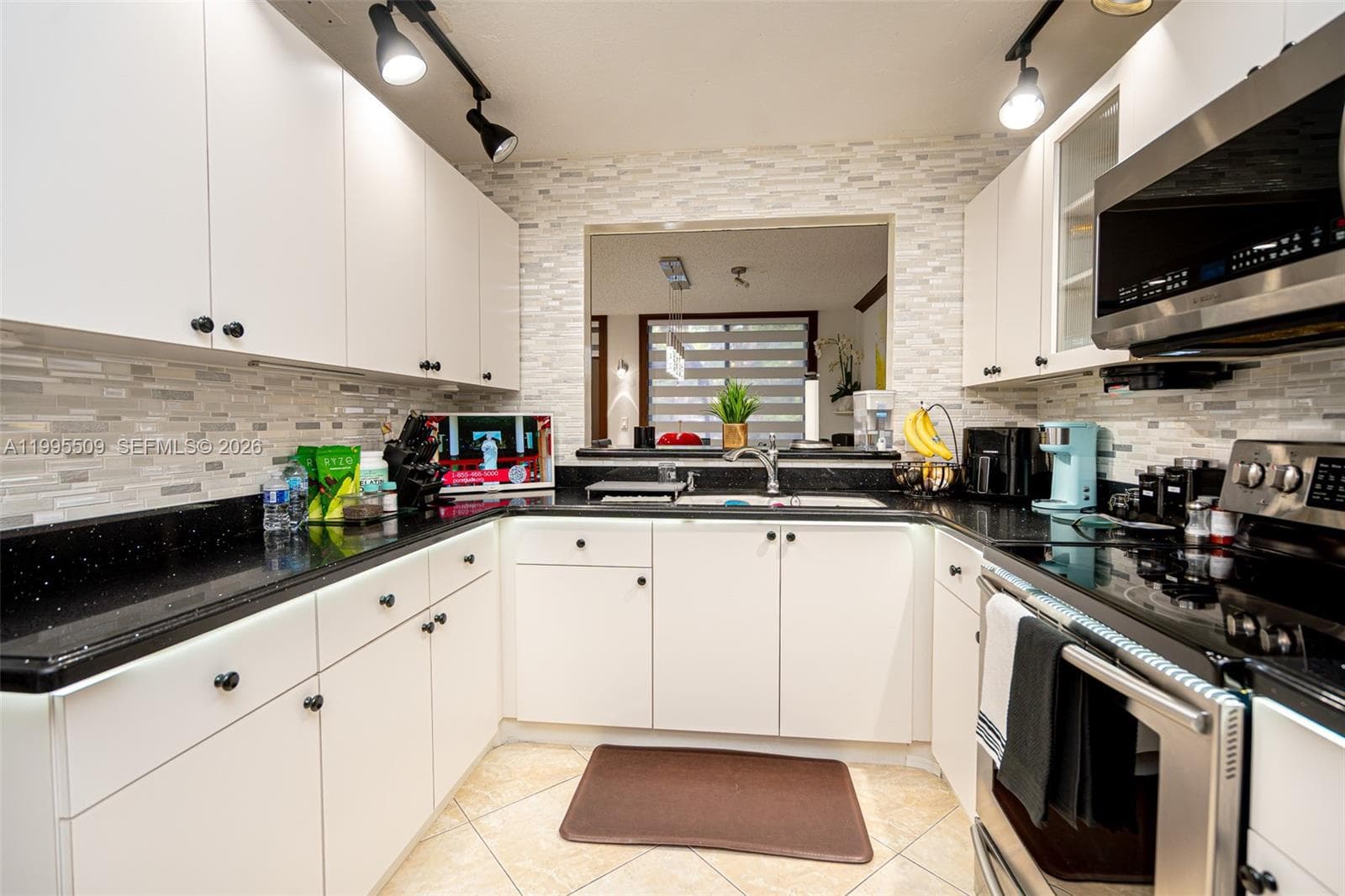 9955 Costa Del Sol Blvd # 108B, Doral FL 33178 — 22