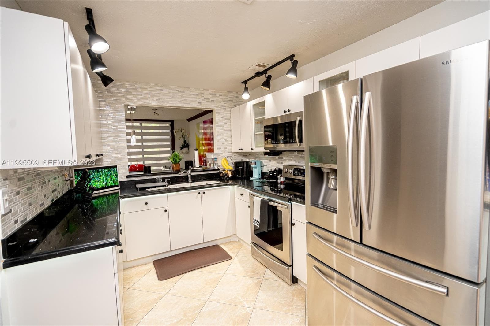 9955 Costa Del Sol Blvd # 108B, Doral FL 33178 — 18