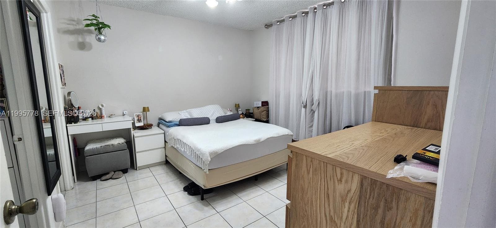 5050 NW 7th St # 210, Miami FL 33126 — 5