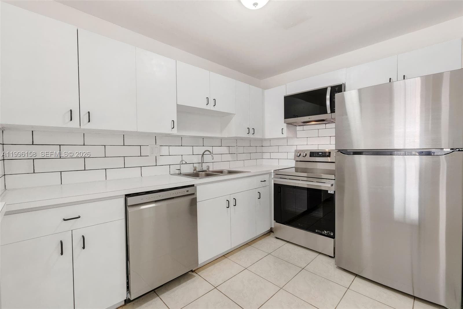 6130 W 19th Ave # 305, Hialeah FL 33012 — 12