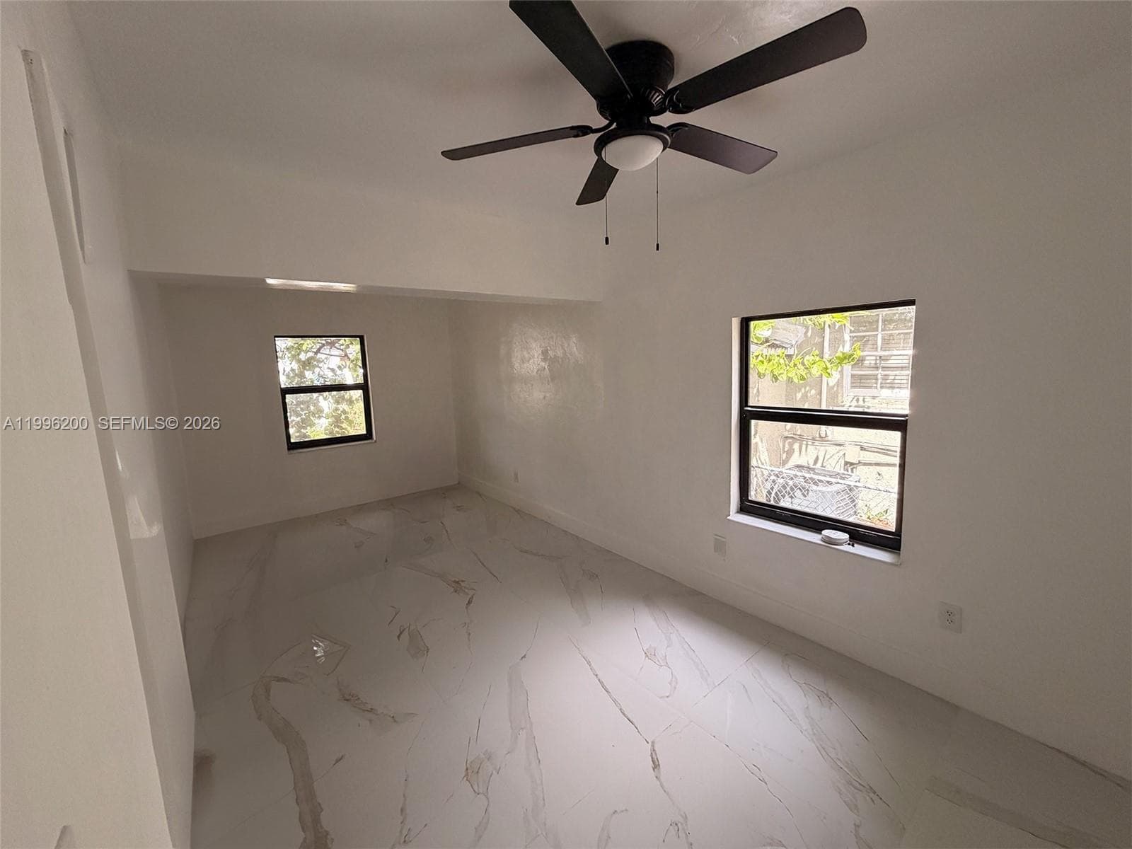 1261 NW 45th St, Miami FL 33142 — 25