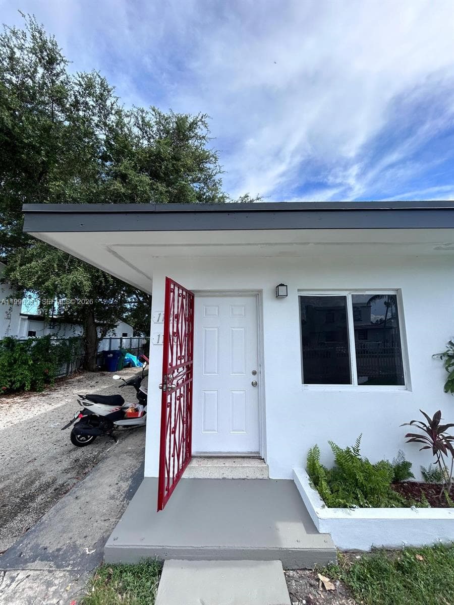 1128 NW 76th St, Miami FL 33150 — 2