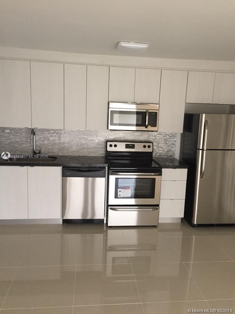 4600 NW 79th Ave # 1B, Doral FL 33166 — 1